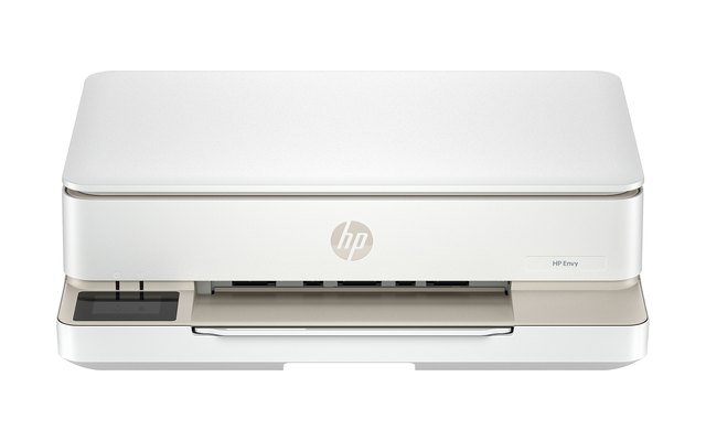 HP Envy all-in-one printer in white with a sand-colored base, front view
