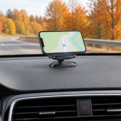 A magnetic phone mount on a car dashboard