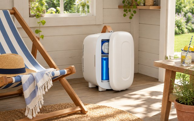 FOHERE 5L mini fridge, on the floor of a garden summer house beside a deckchair